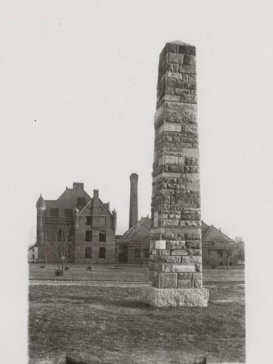 A large stone monument in the 1800s