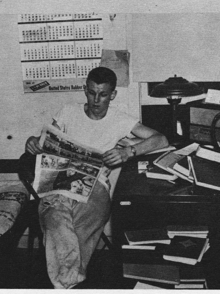 A student in a dorm room in 1949