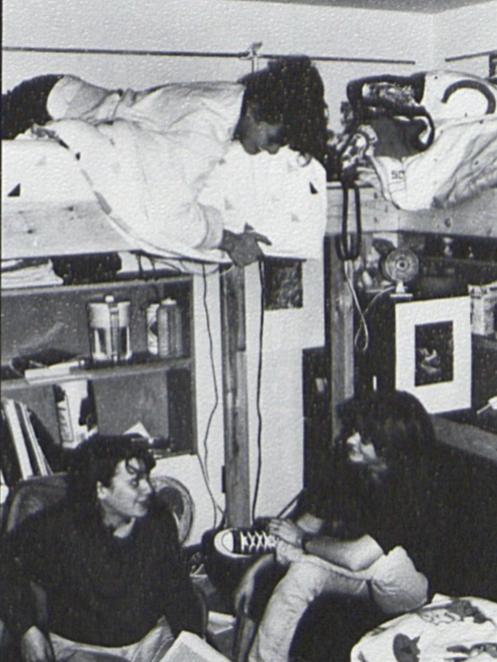 Three students in a dorm room in the mid 1990s