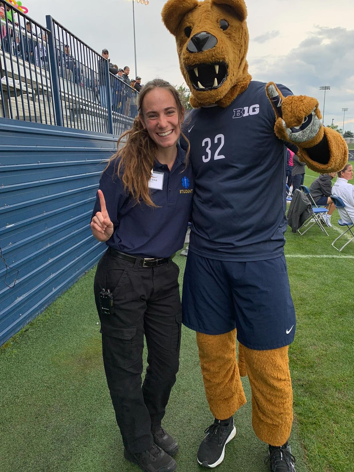 Fedorshak with the Nittany Lion at a sports event