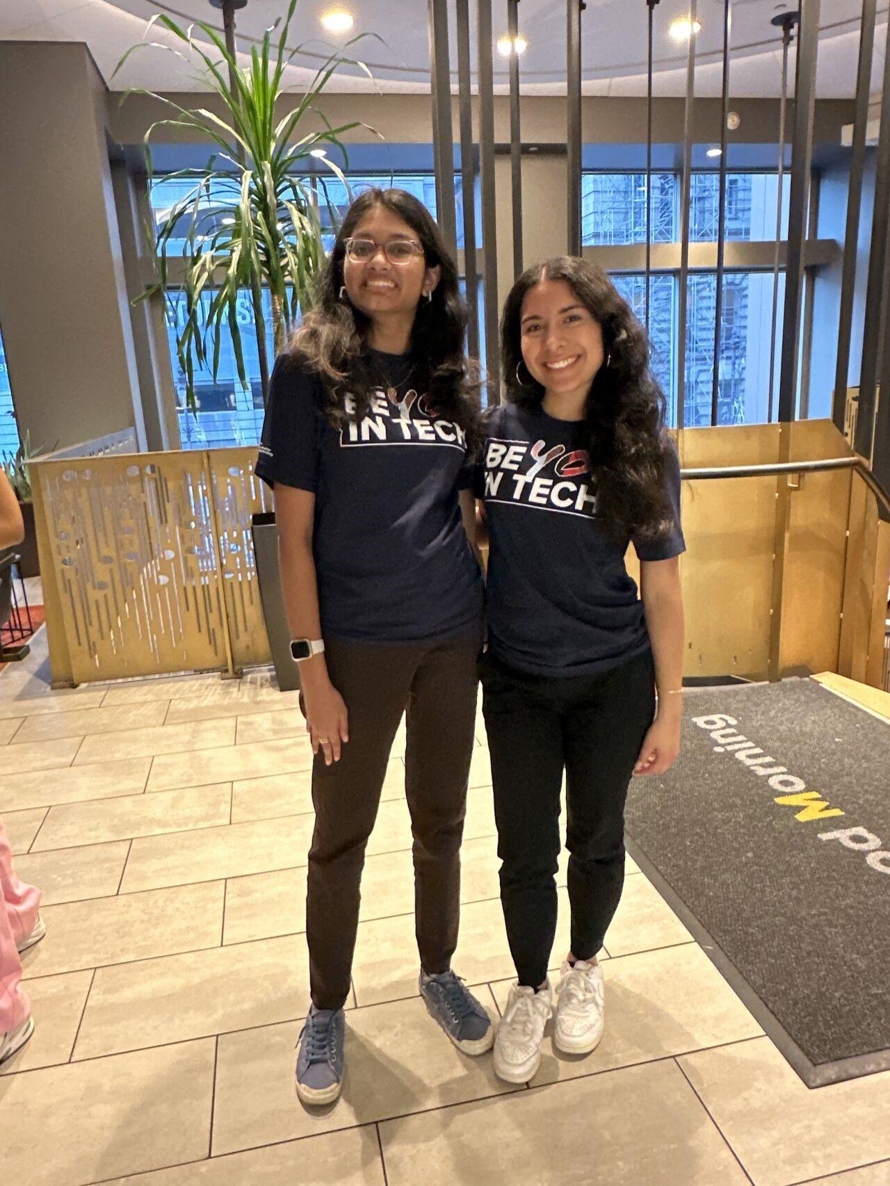 two people with matching t-shirts