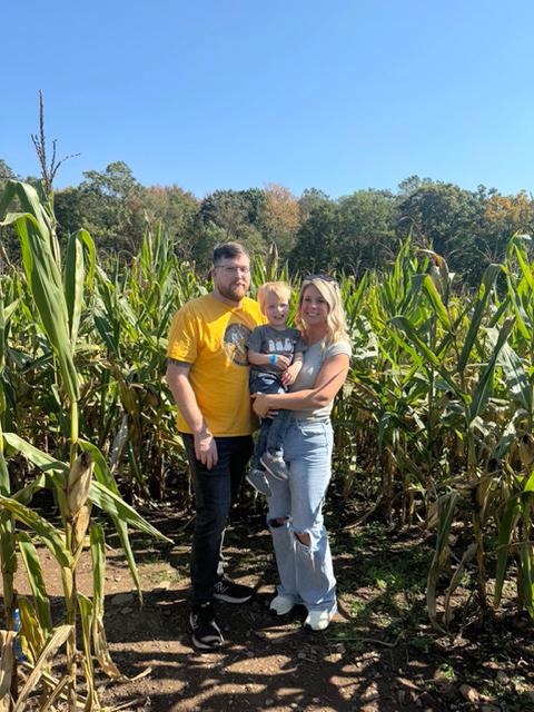 Michael Balmford with wife Allison and son Noah at a corn maze this year.