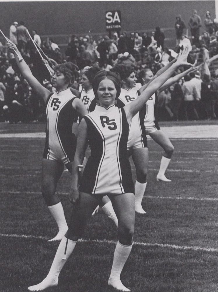 A group of majorettes on the field