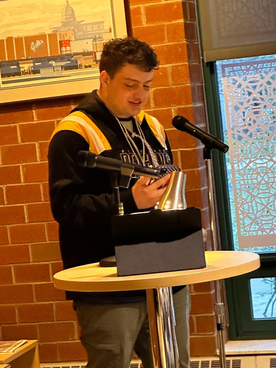 Student Reilly Keen reads an original poem based on The Raven by Edgar Allan Poe.