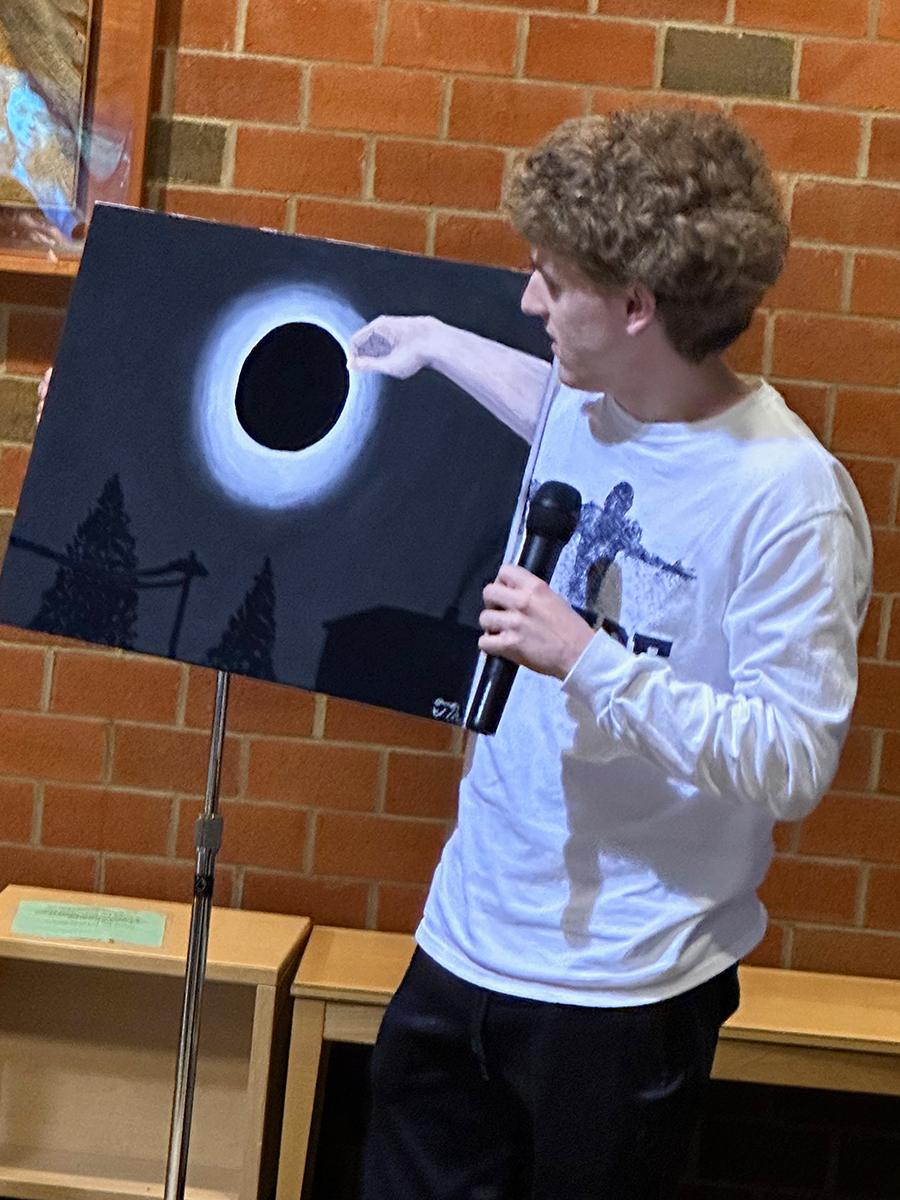 Student Talon McKendree shares an original painting.