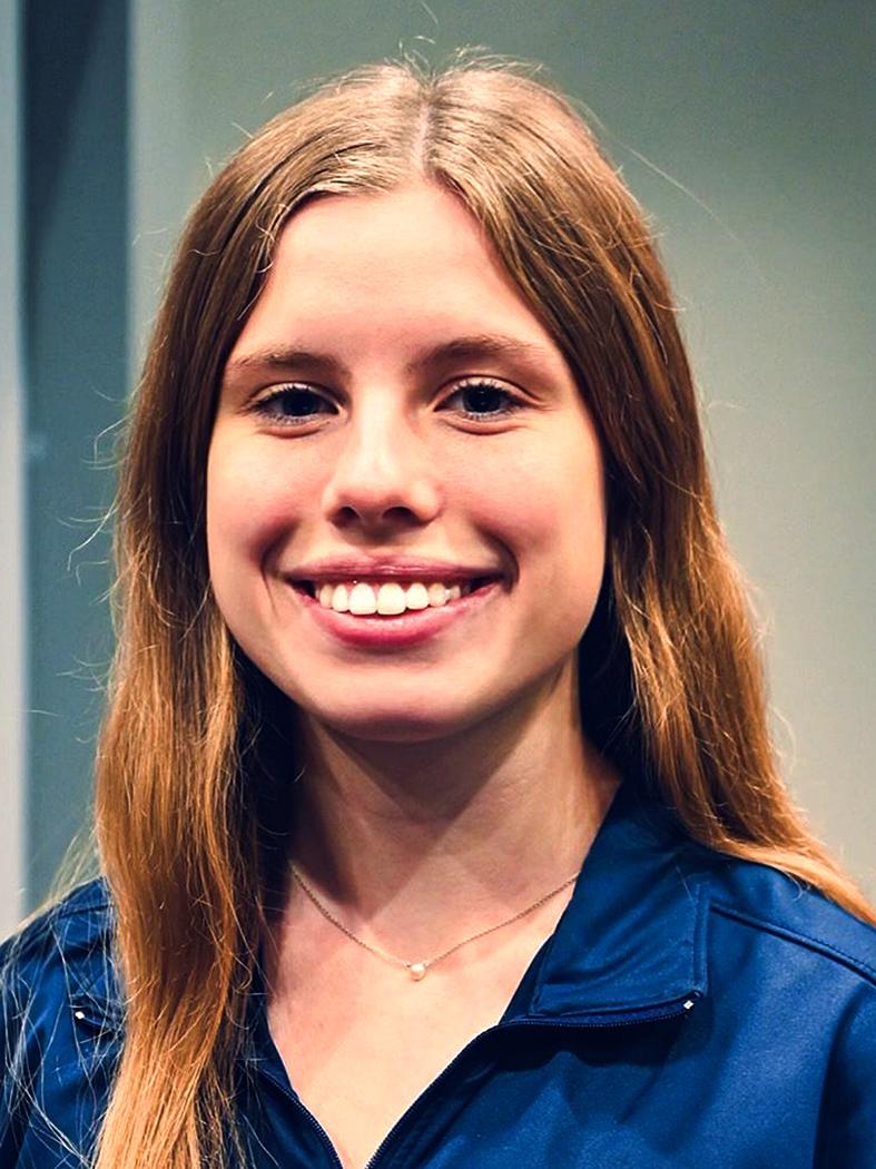 Smiling girls with long light brown hair