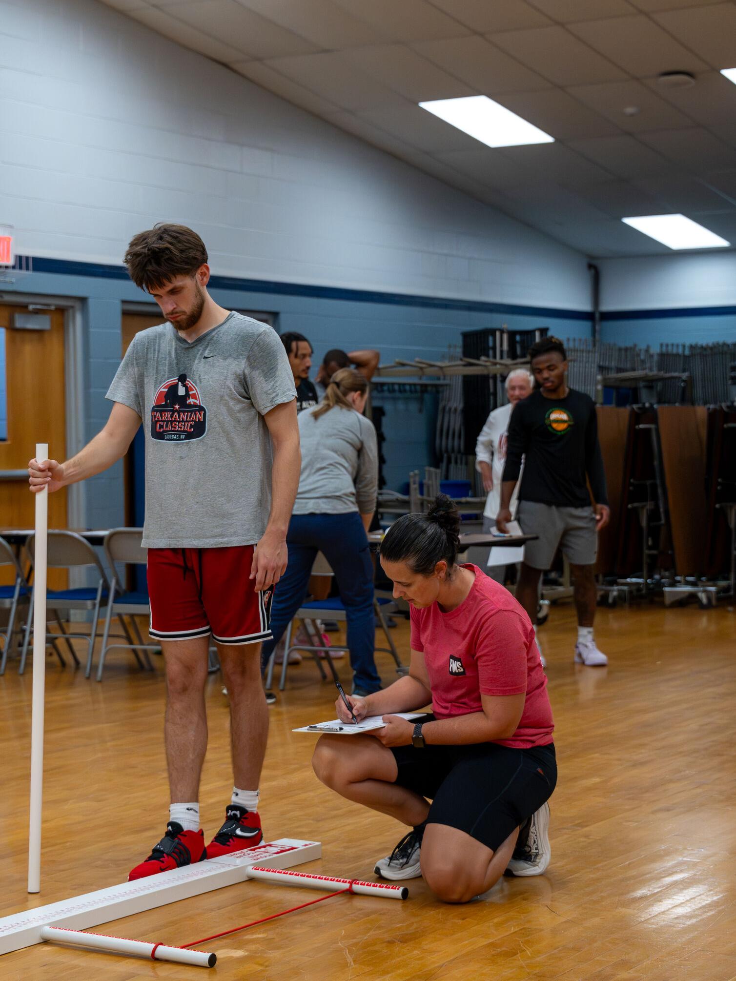Student-athlete completes a Functional Movement Screening