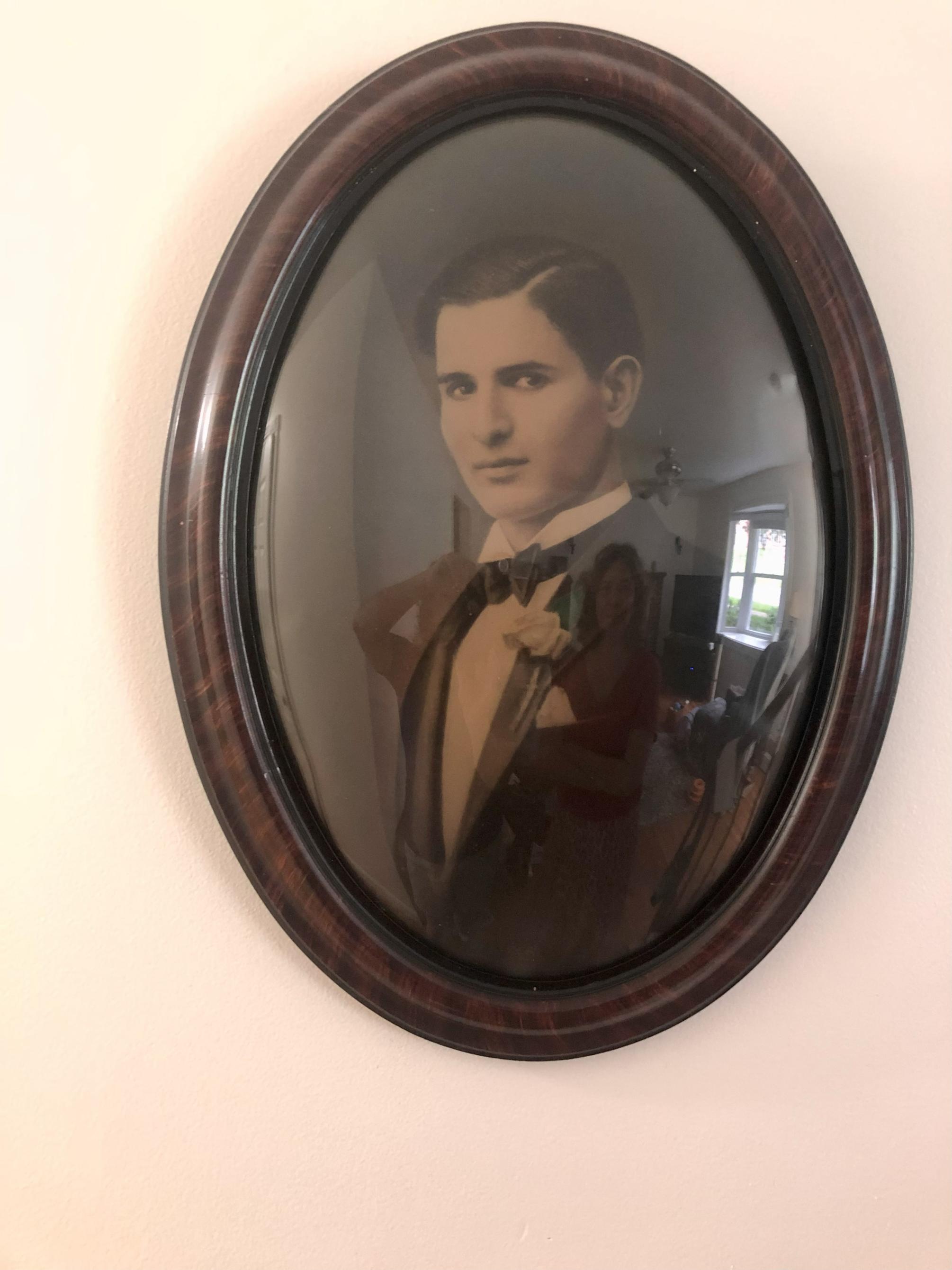 A framed photo of Vincenzo “Jimmy” Murtari 