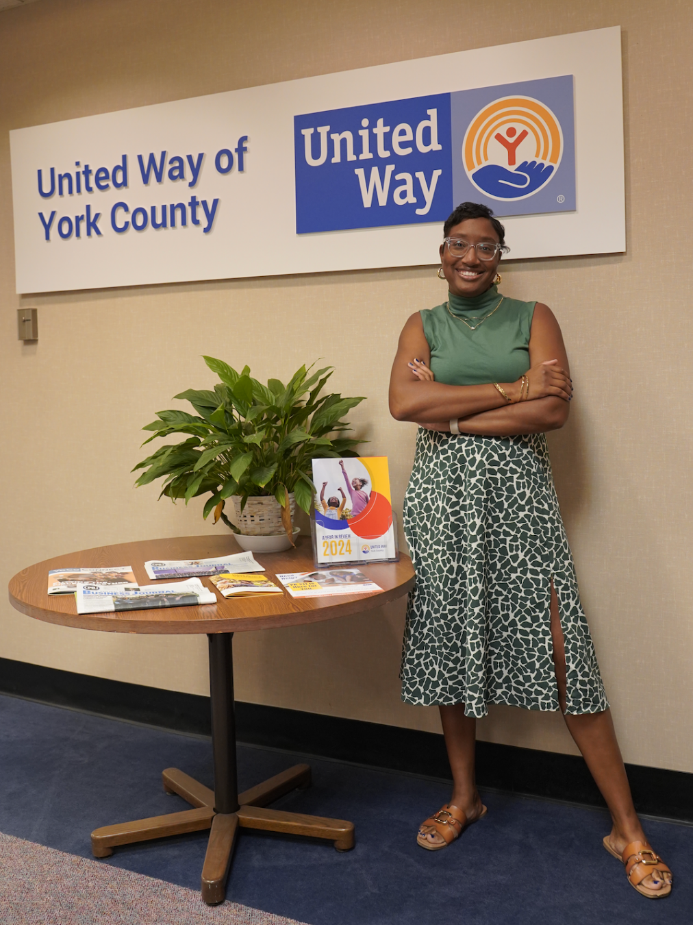 TaTyana Abreu poses in front of a sign that says "United Way of York County"