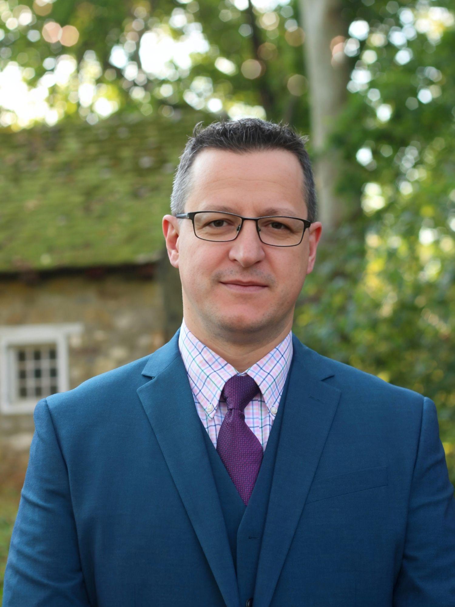 a man in a suite and tie