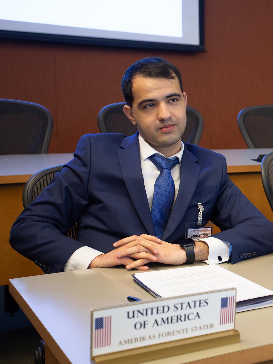 A member of the U.S. delegation listens to a speech during the closing plenary.
