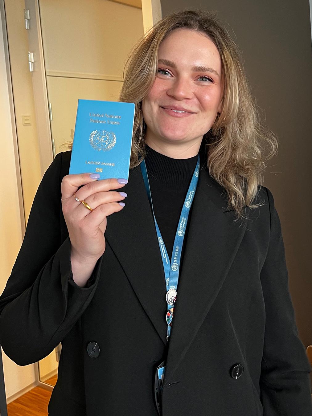 Kayla King-Majstorovic upon receiving her first laissez-passer in 2023, allowing her to travel on behalf of the World Health Organization for official business and duty travel.