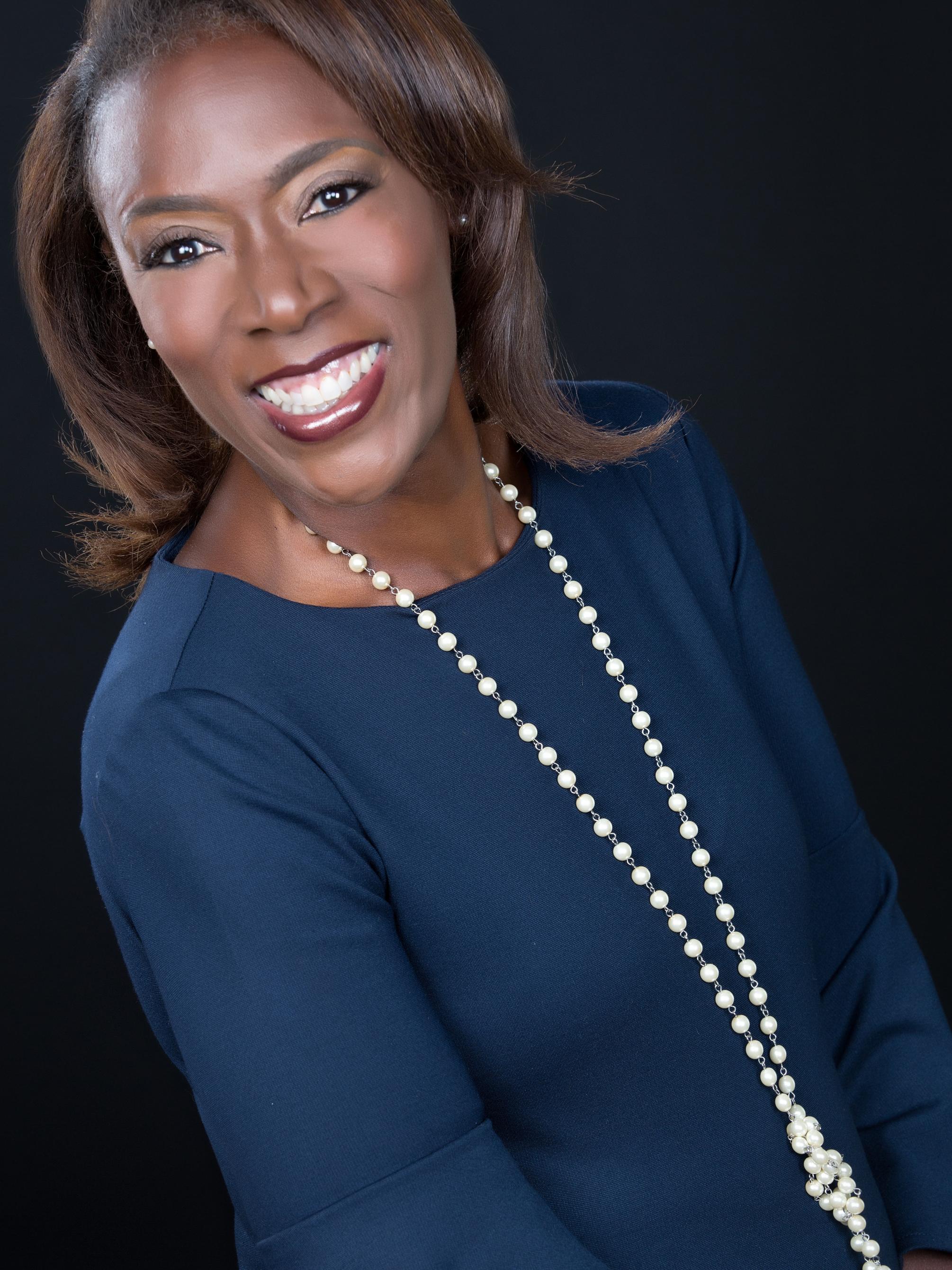Kenya Mann Faulkner headshot 