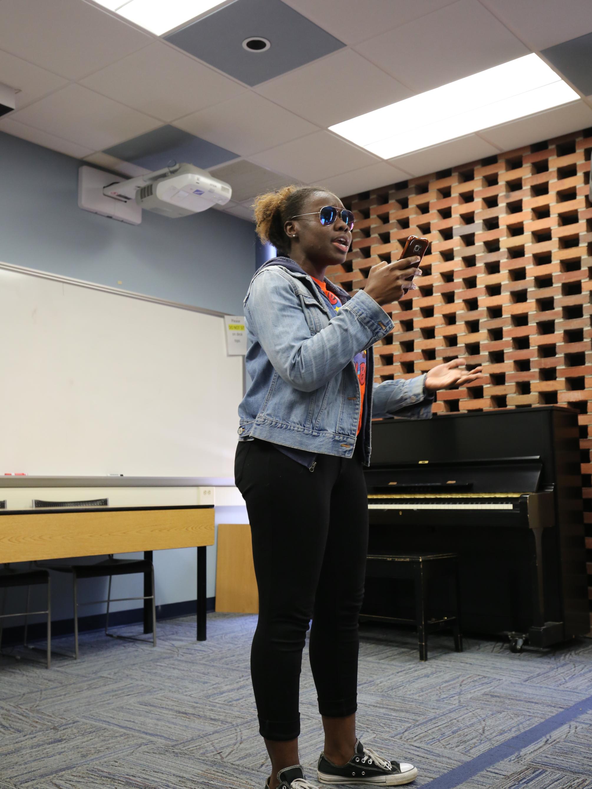 Delisa Williams reads a poem. 