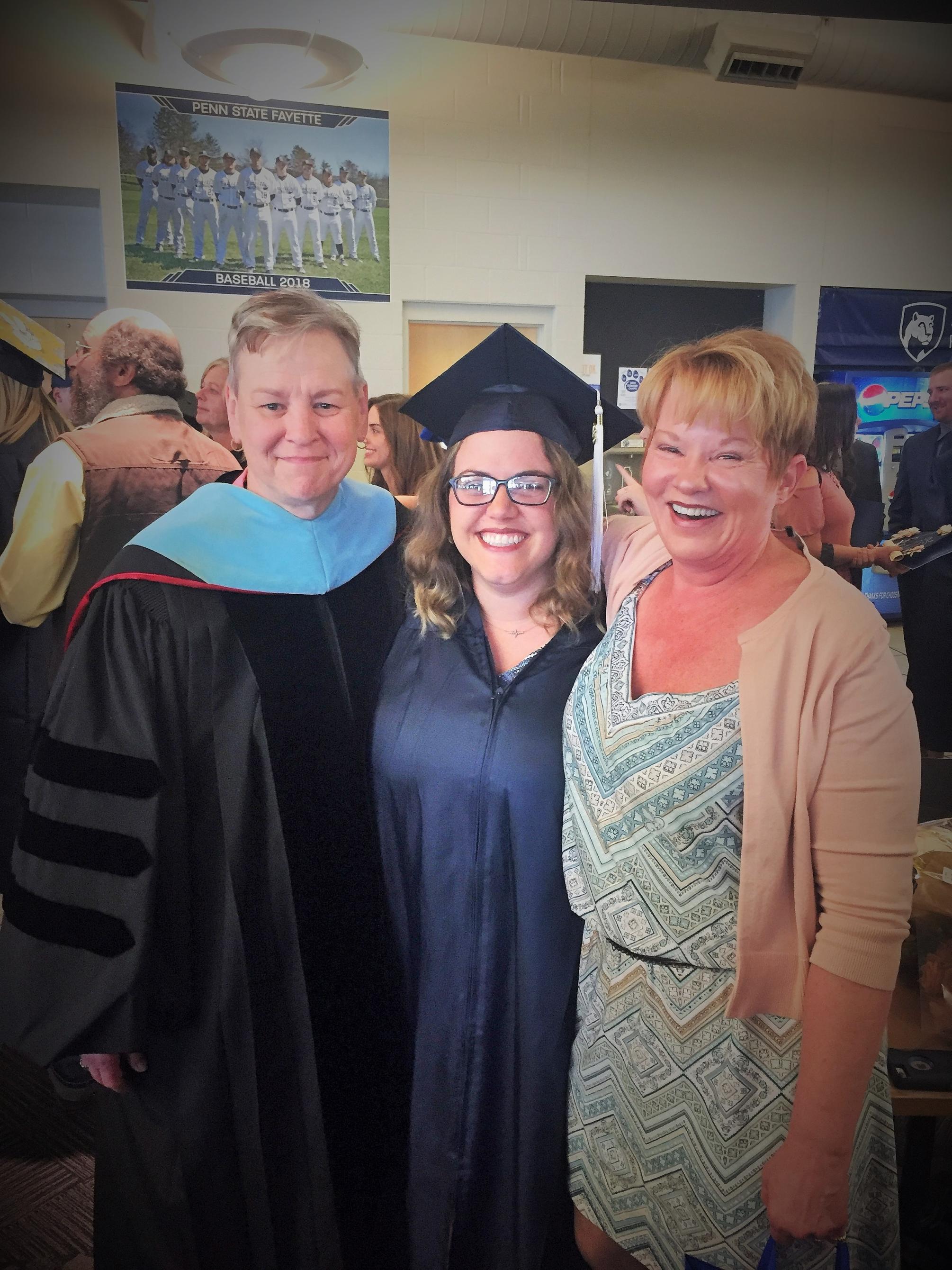 Malory Spring poses at her commencement with Dr. Jo 