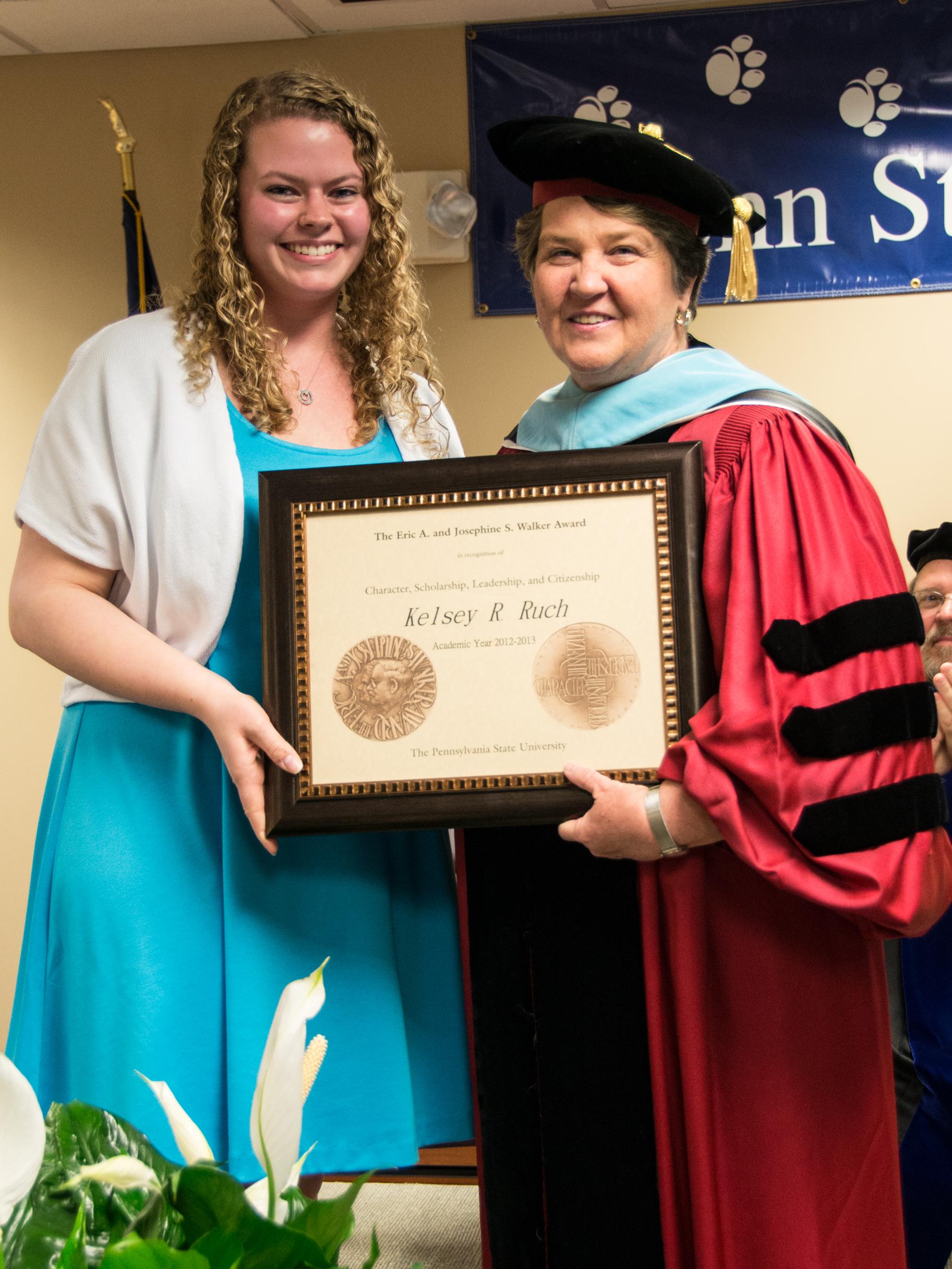 Kelsey Ruch receives the 2013 Walker Award from Chancellor Ann Williams during the campus' annual Honors Convocation.