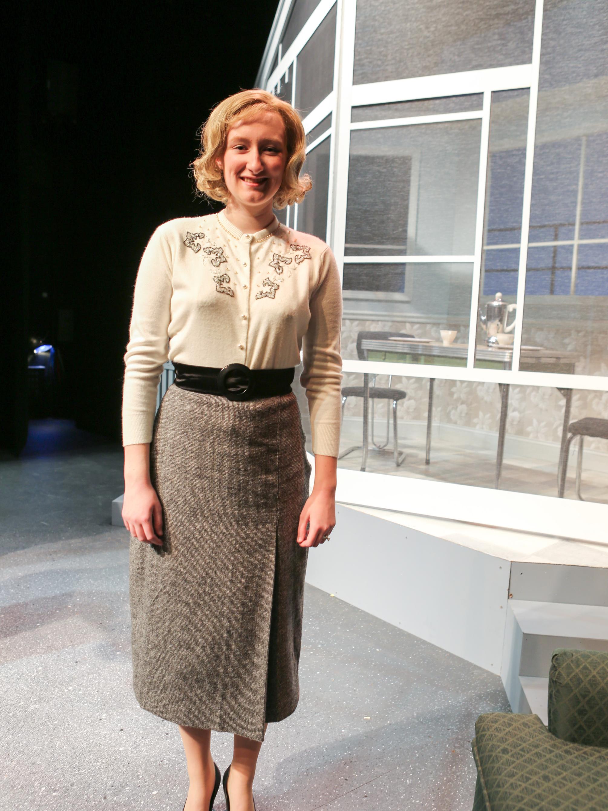 Grace Kiver wears one of the costumes from "Trouble in Tahiti."