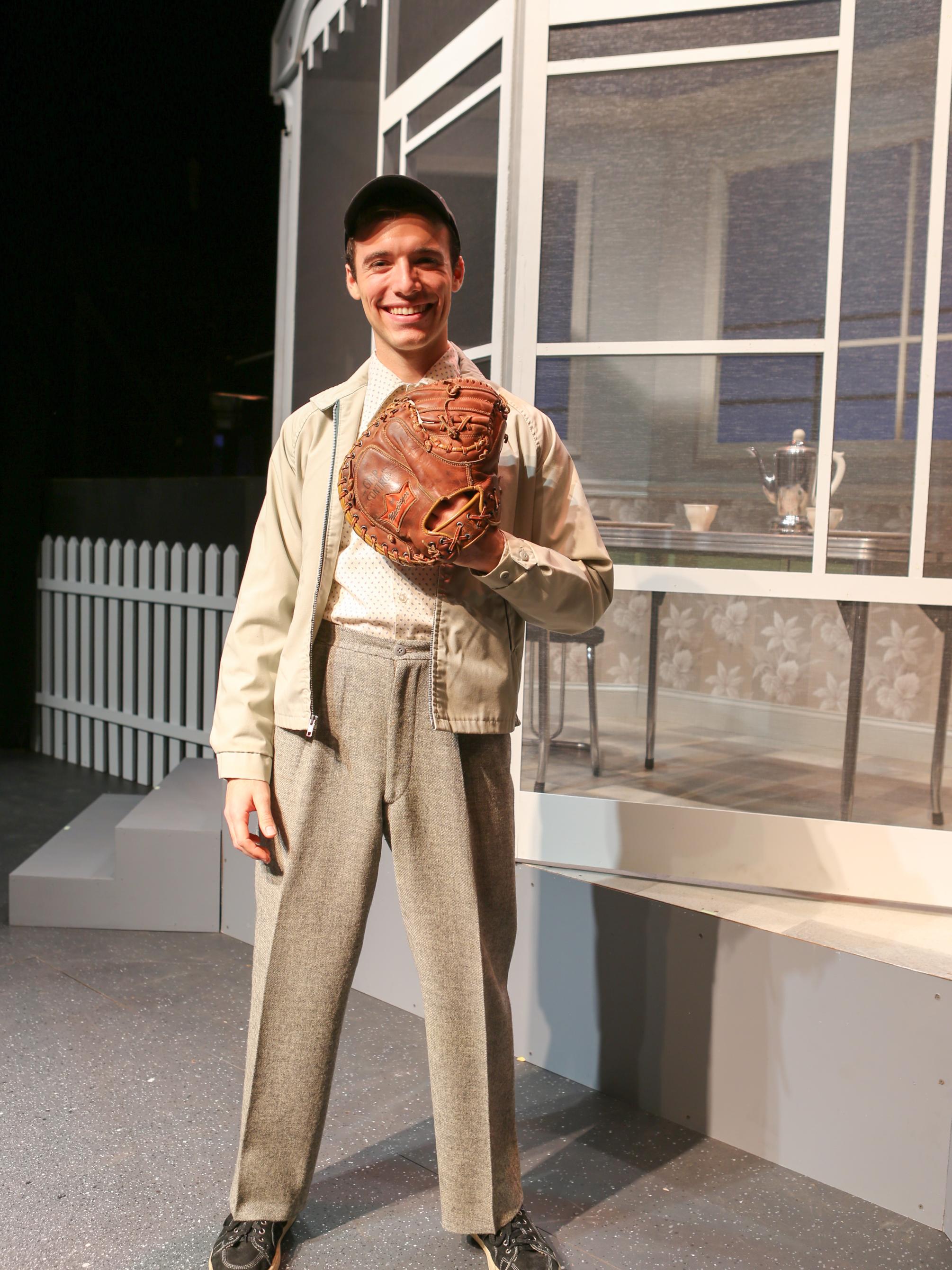Kevin Dort wears one of the costumes from "Trouble in Tahiti."