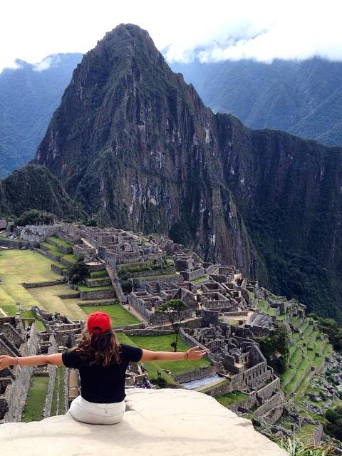 student looks at Andes mountains