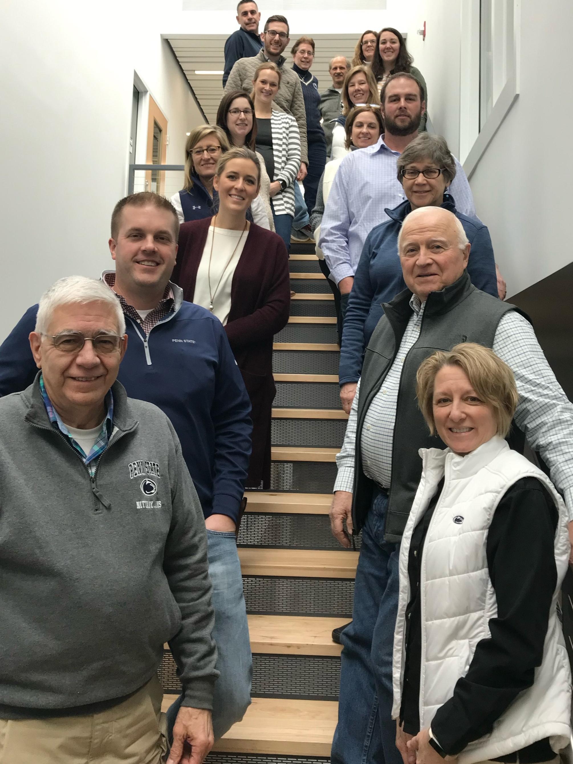 People lining a stairwell