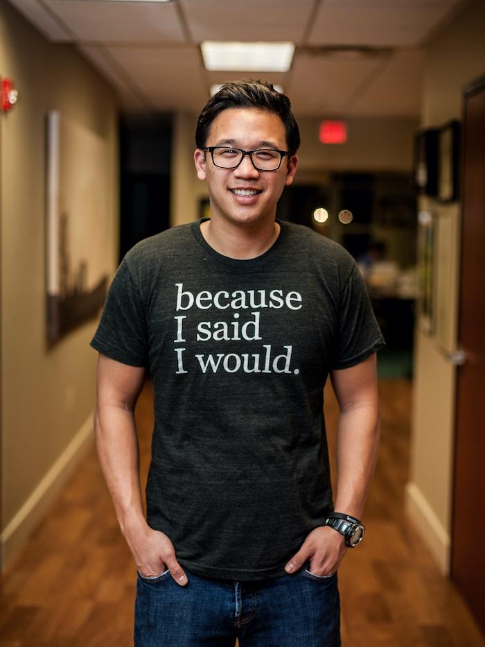 Portrait of Alex Sheen in shirt that reads because I said I would.