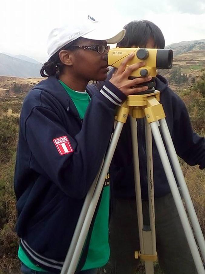 Amina Grant surveys canals in Peru