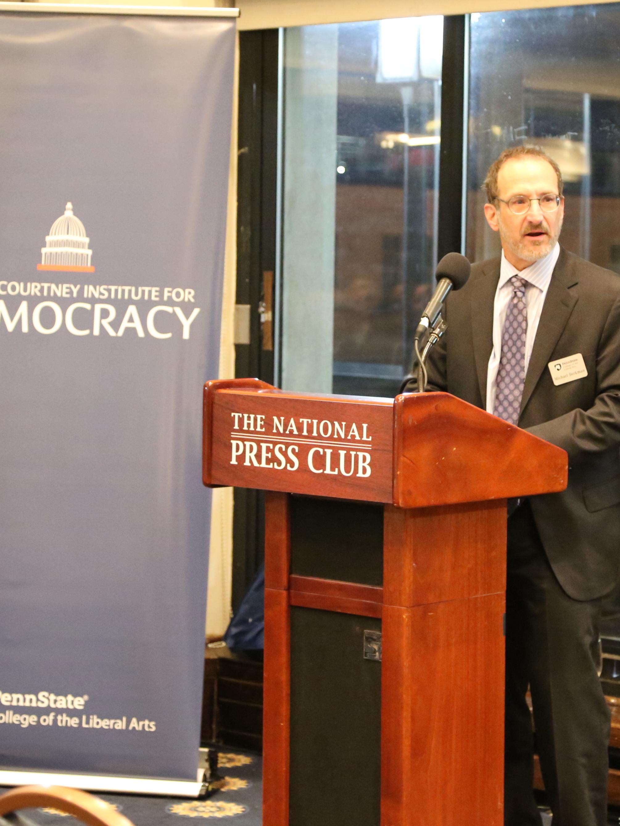 Michael Berkman speaking at the National Press Club
