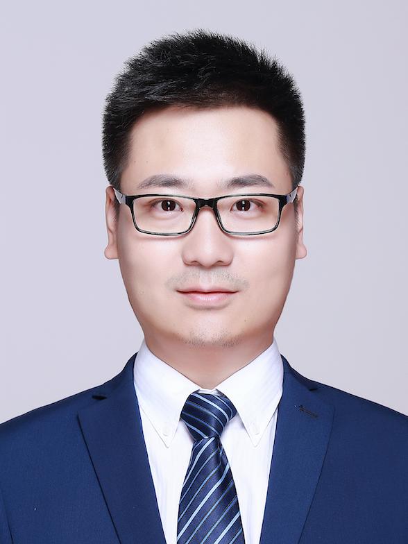 male student in business attire poses for professional headshot photo