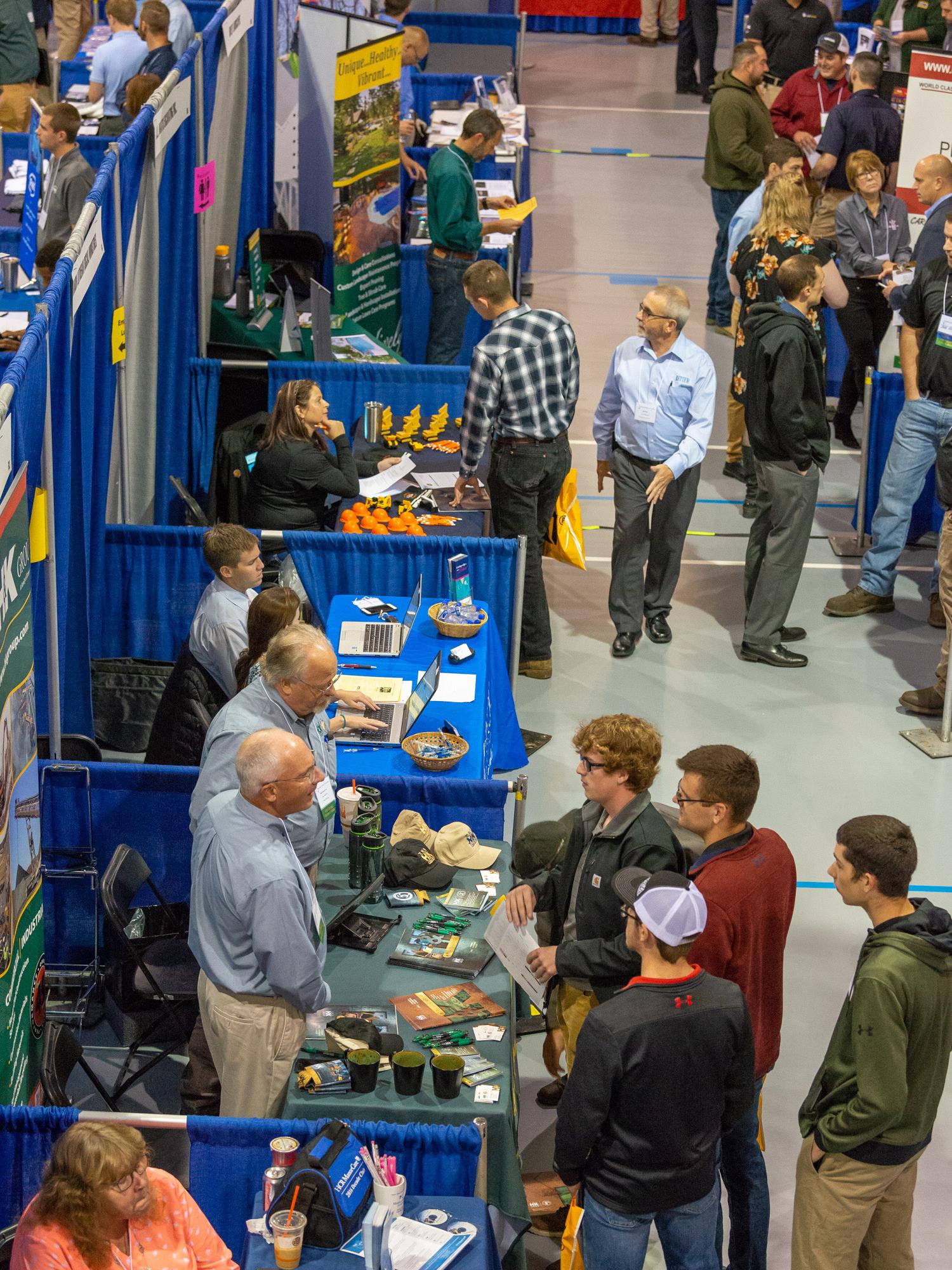 Students on the floor of the Penn College fall 2018 Career Fair