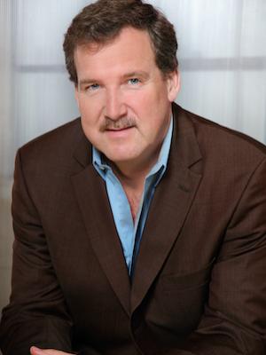 a person posing for a professional headshot