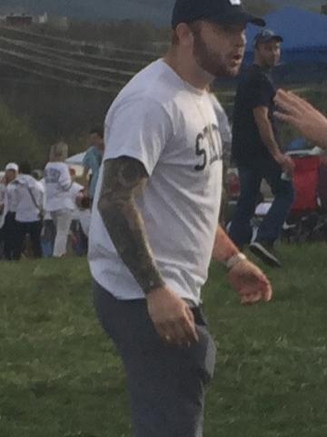 University Police are seeking to identify the pictured suspect, who is wearing a blue hat, white shirt and gray pants.