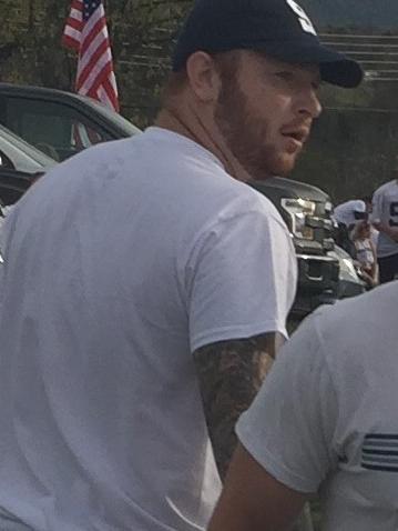 University Police are seeking to identify the pictured suspect, who is wearing a blue hat, white shirt and gray pants.