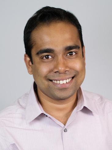 A headshot of a male professor.