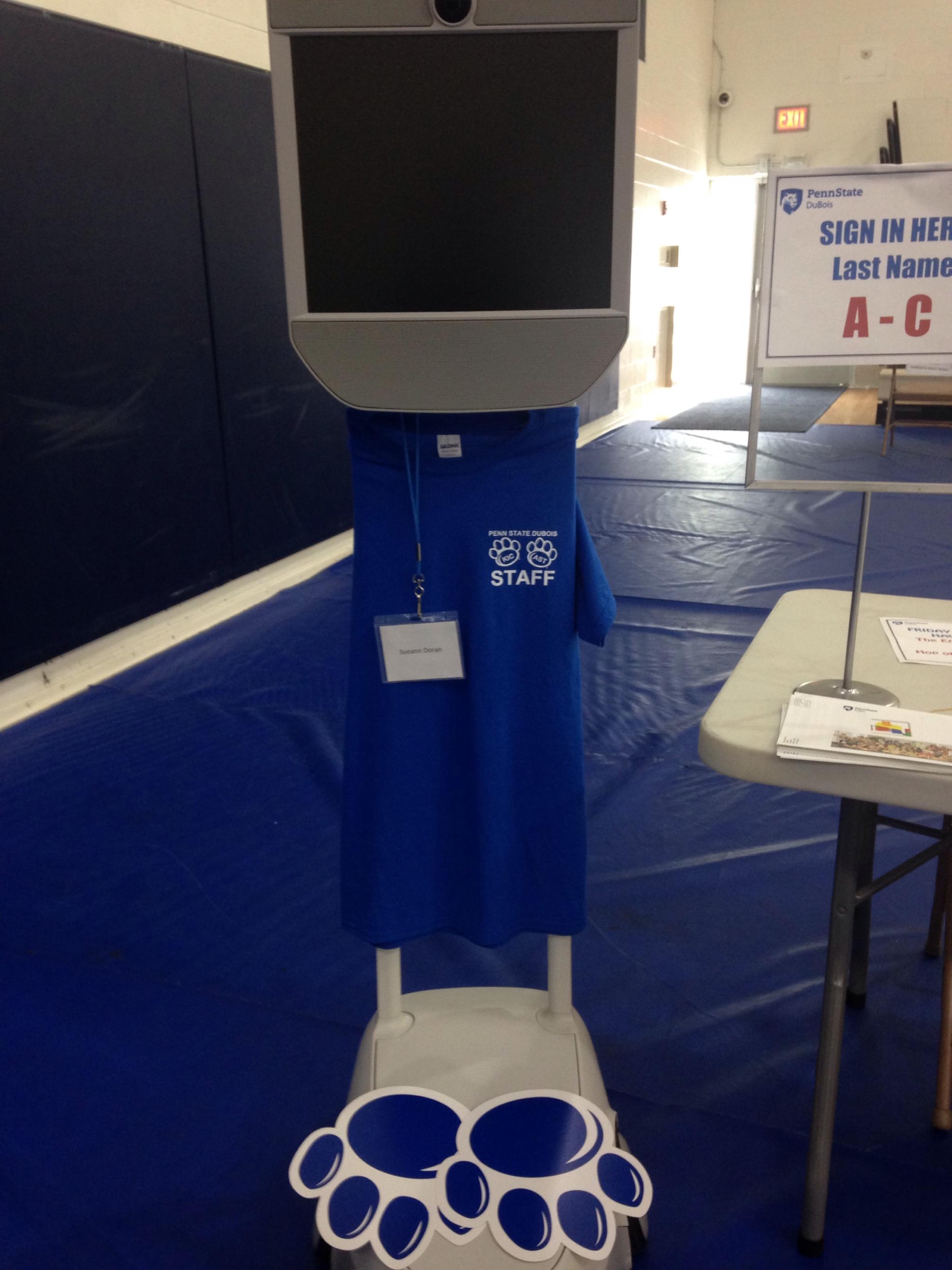 Beam dressed in Penn State attire with paw stickers on its base