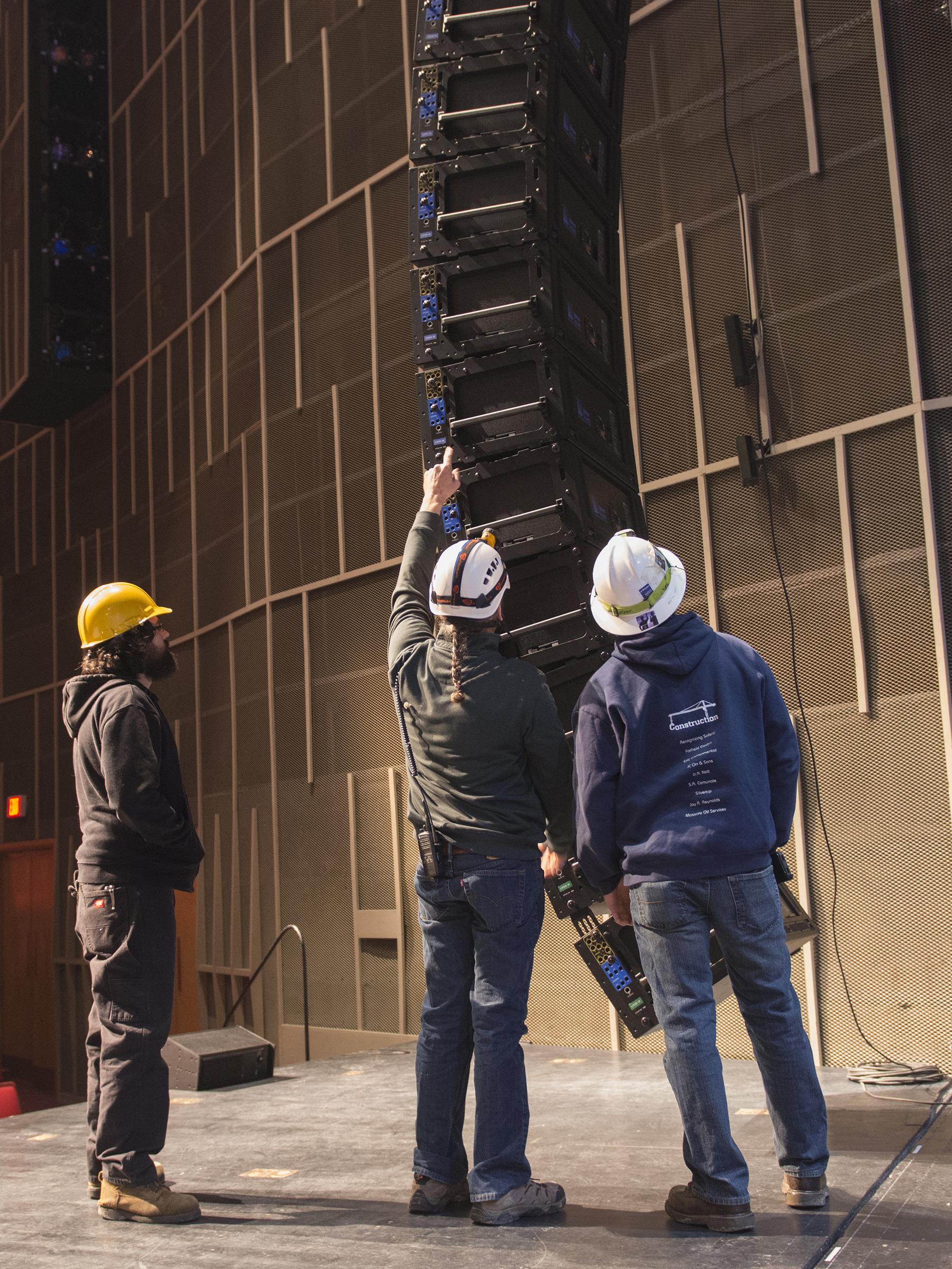 Raising speakers into place