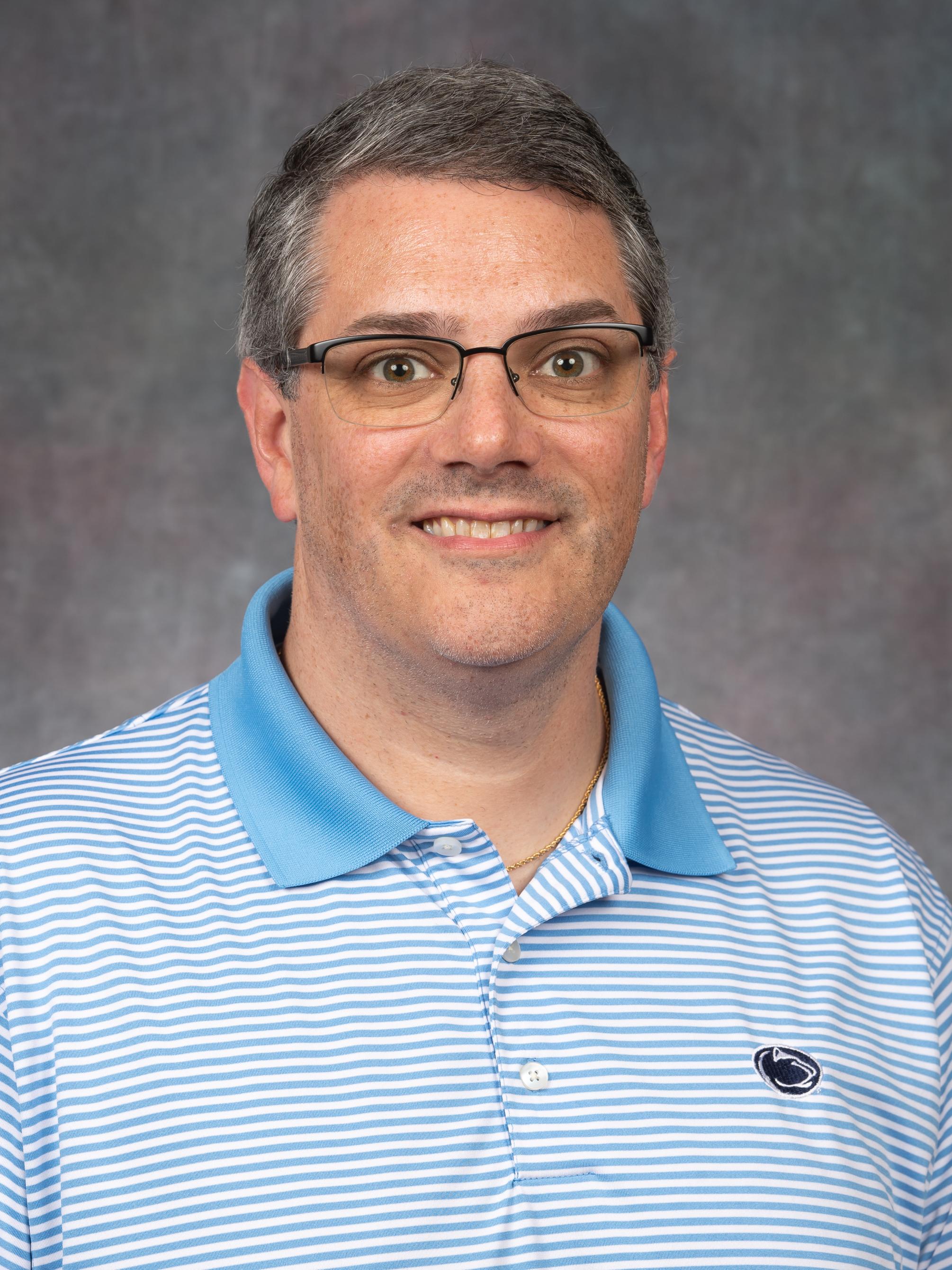 headshot of Eric Robbins