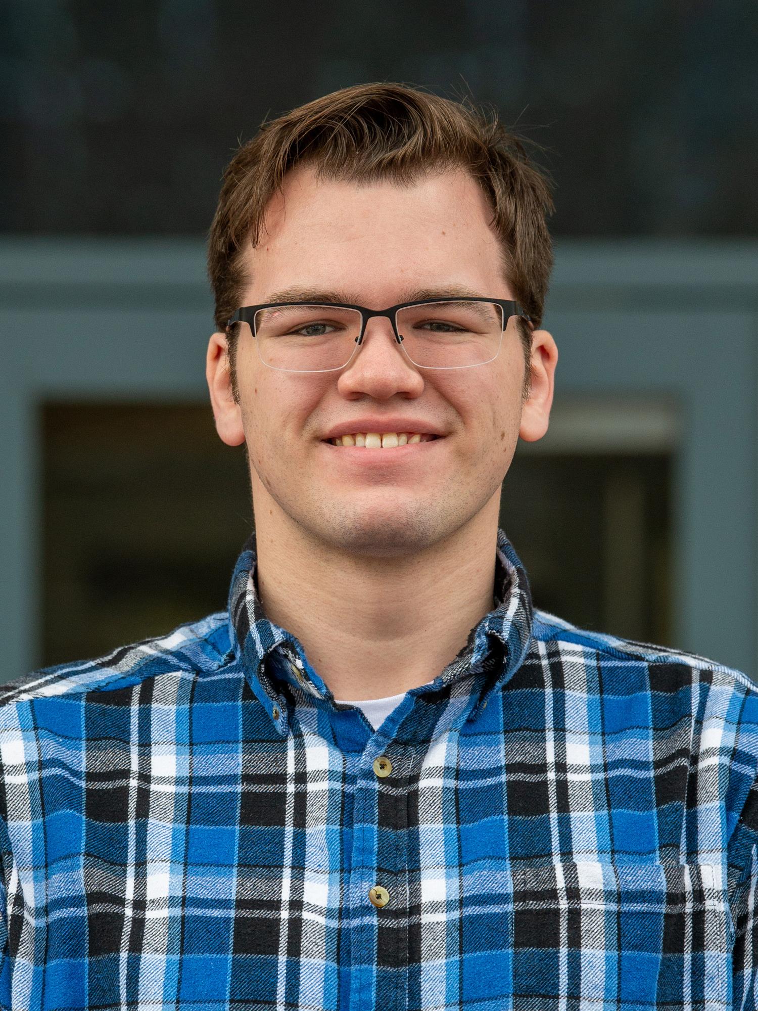 A head and shoulders photo of Ethan S. Rhodes-O’Brien