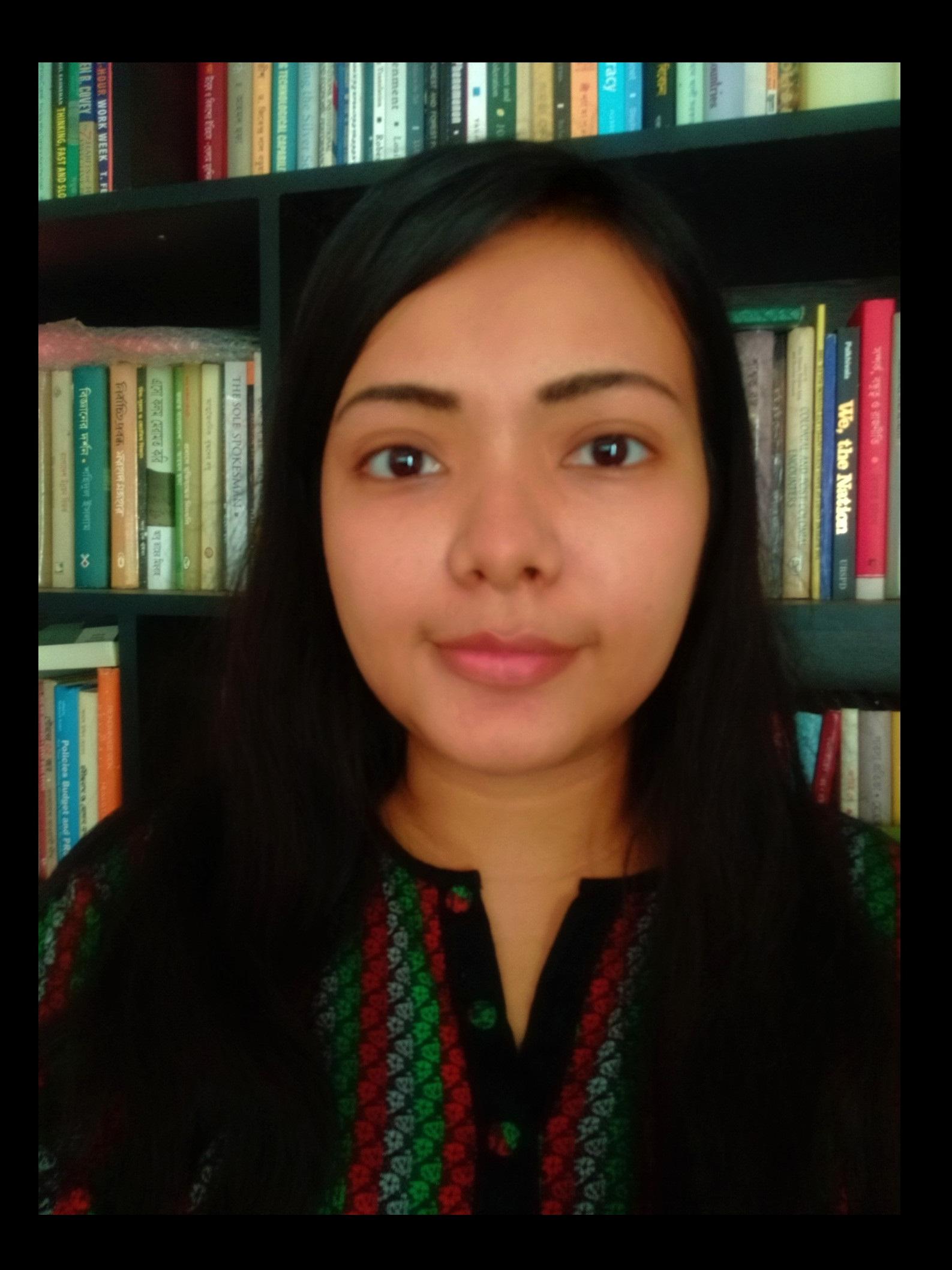 female student poses for headshot photo