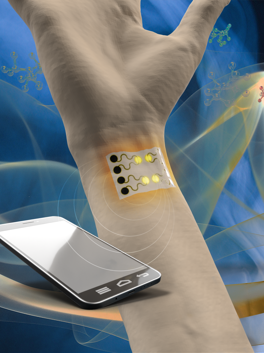 Hand and arm showing sensor applied to inner write with moble phone sized read beside it.