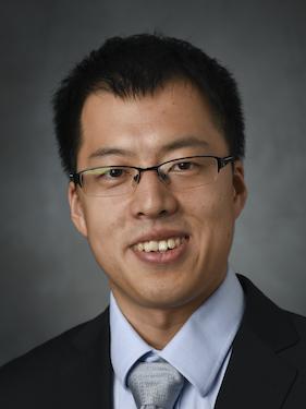 A head and shoulders photo of a man.
