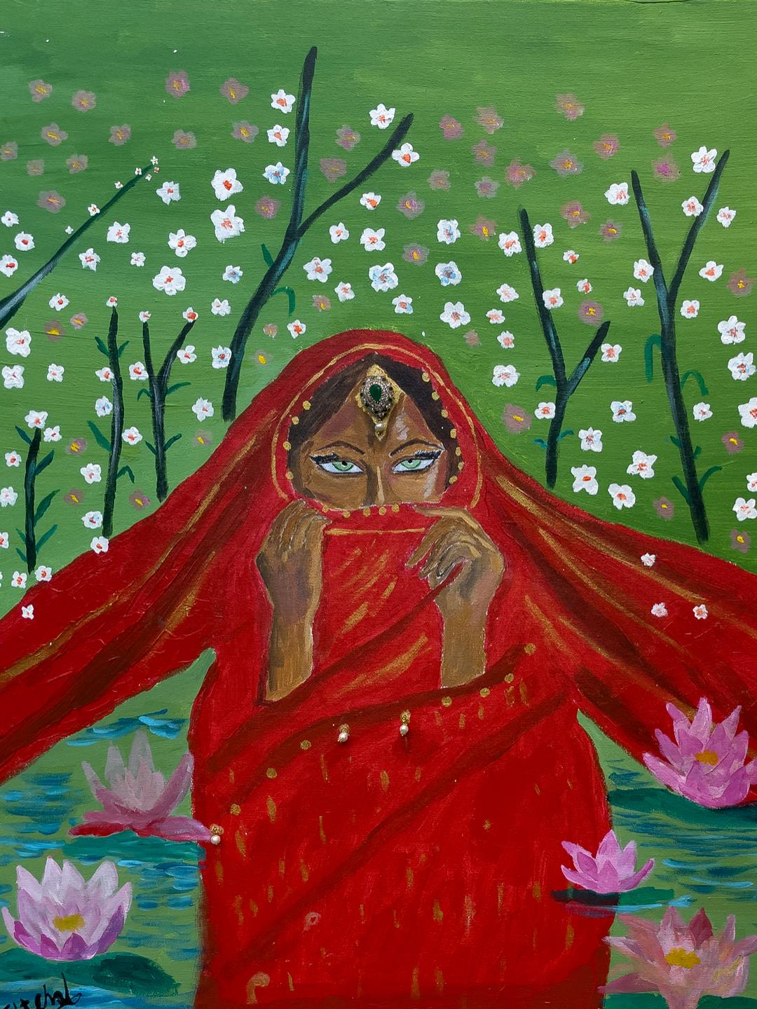 Indian women in front of trees and flowers