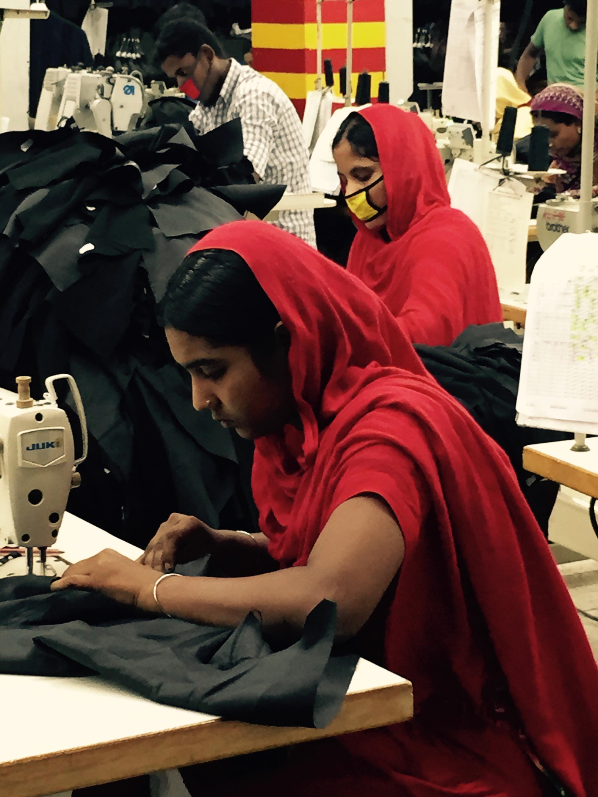 A woman working in a garment factory. 