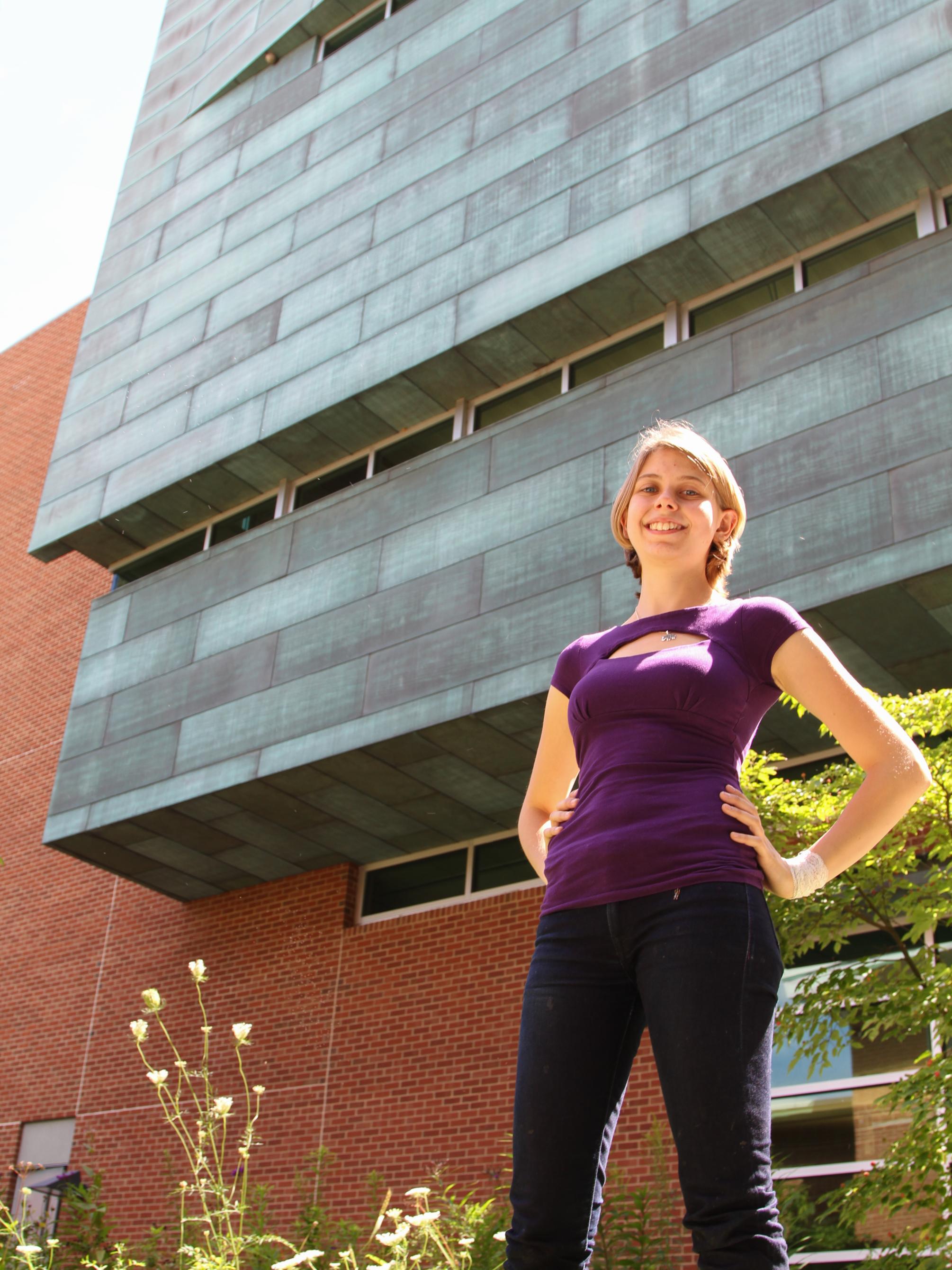 Lily McCullough in front with the Stuckeman Family Building in the background