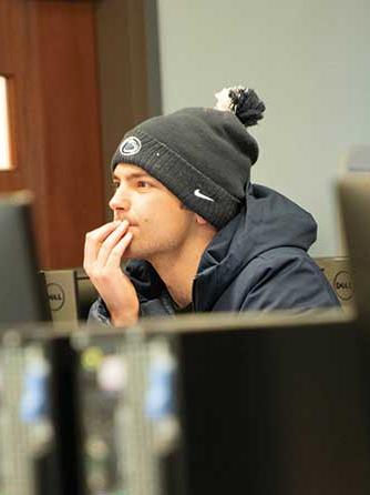 Zach Sowa listens attentively in class