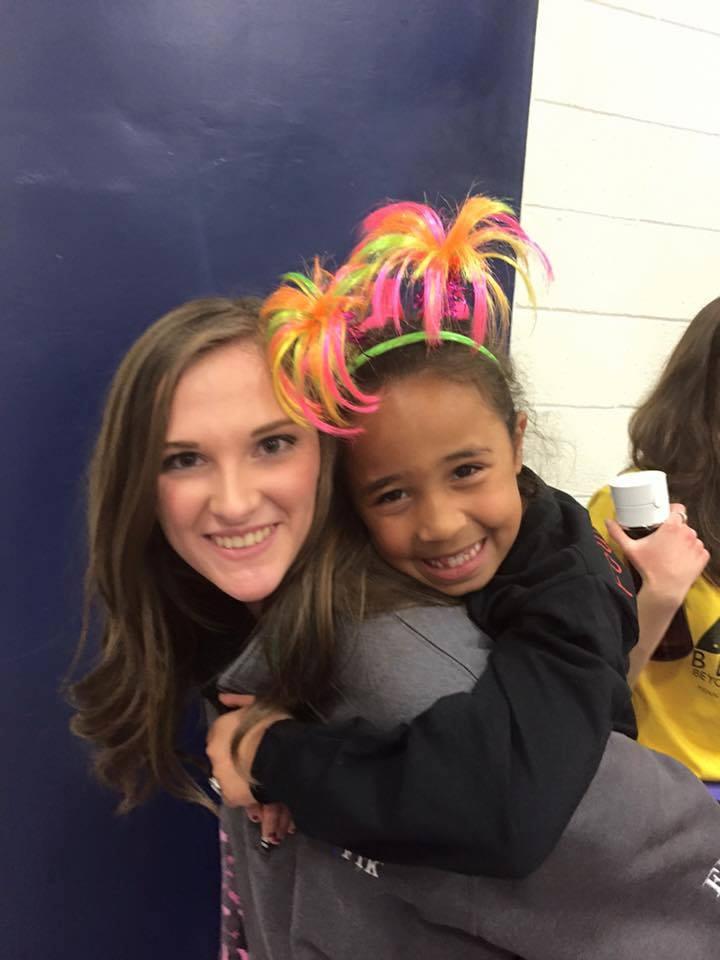 Kathleen Beck and IST Benefiting THON's child. 