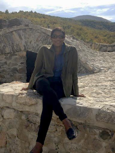 Dr. Nicole Webster (Ag Sciences) on a bridge in Kosovo