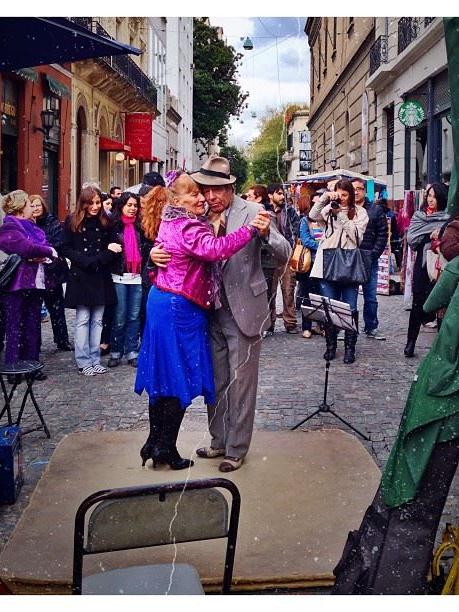 A couple dancing in the streets of Buenos Aires, Argentina