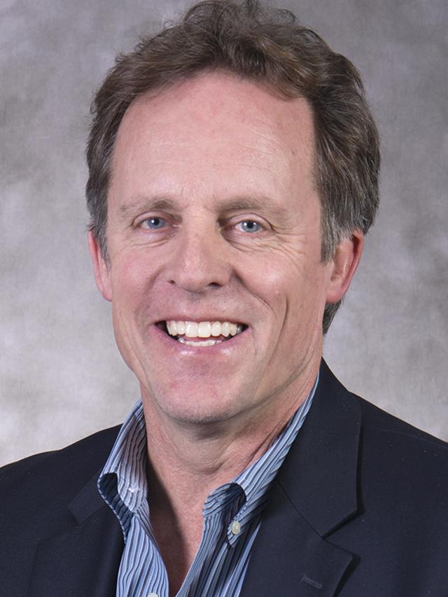 Headshot of Lee Kump