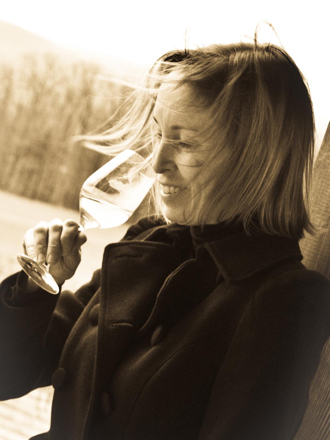 Woman drinking out of wine glass