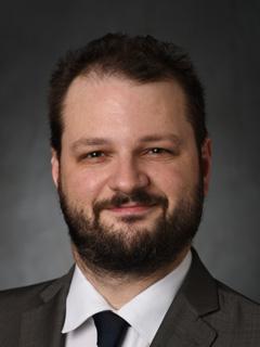 Portrait of a man in a suit and tie